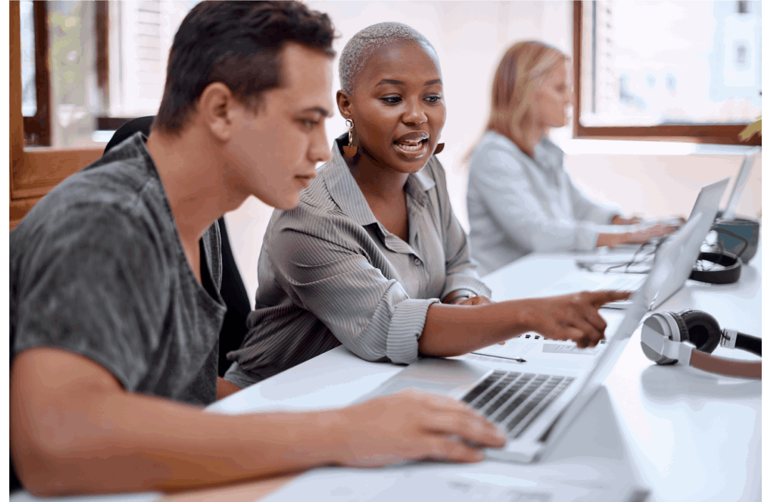 woman points to laptop screen man assists with EPD software