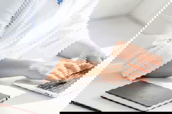 Mental Health Care Provider Behind Laptop