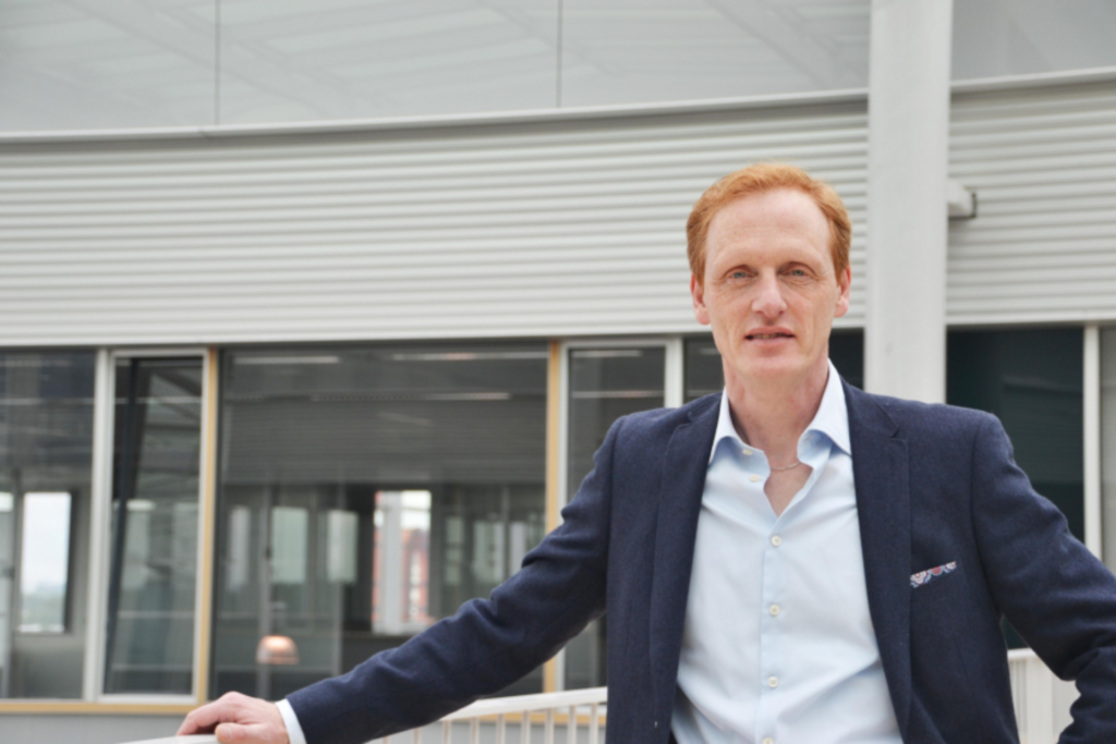 Gideon Kreytz stands in front of HCI headquarters