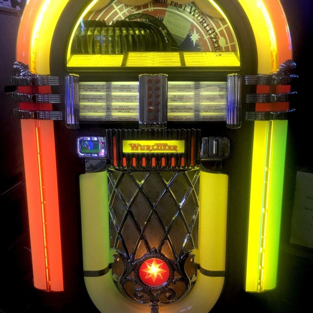 Wurlitzer 1015 OMT Jukebox met Singles in nieuwstaat!