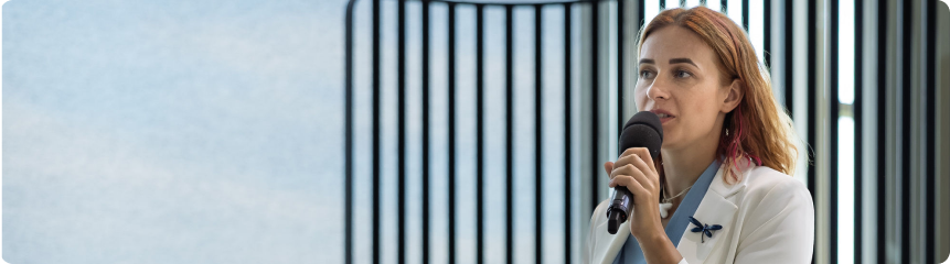 Woman presenting at conference