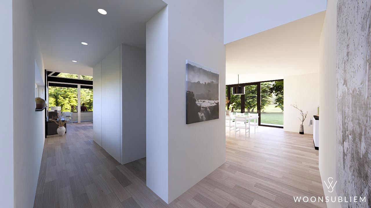 Moderne hal van witte schuurwoning met zicht op woonkamer en tuin