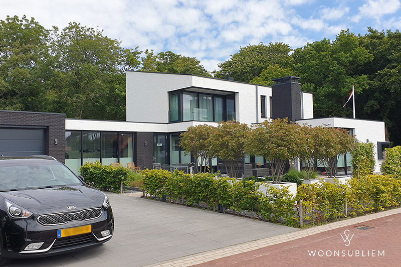 Eigentijdse woning van WoonSubliem – speelse architectuur met verrassende volumes, warme materialen en doordachte zichtlijnen. Ontwerp #184 met unieke woonbeleving